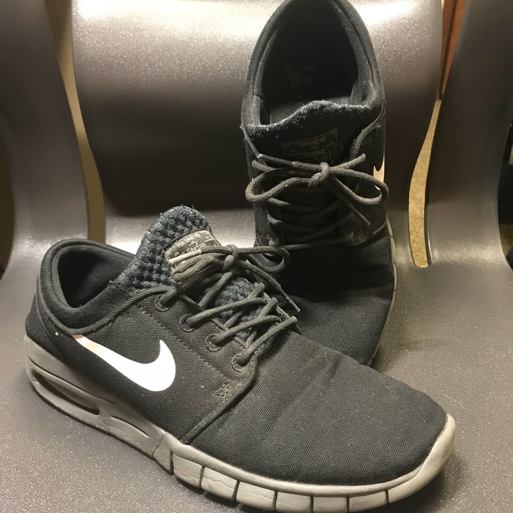 Nikes - image 1